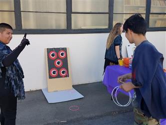 students playing carnival games