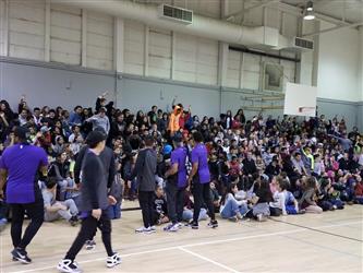people seated in gym