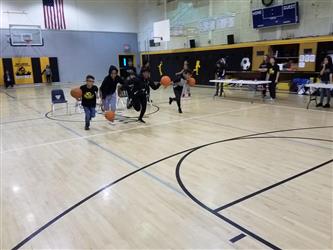 students playing basketball