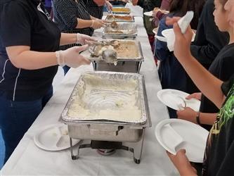 students lined up for food