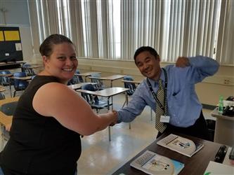 two people shaking hands