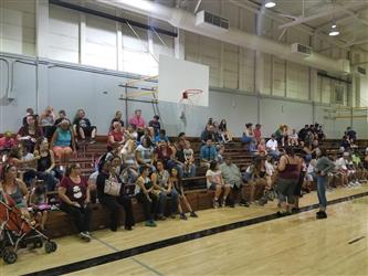 people gathered in gym