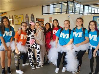 students dressed up as cow and ballerinas 