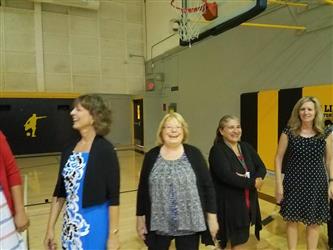 people gathered in gym