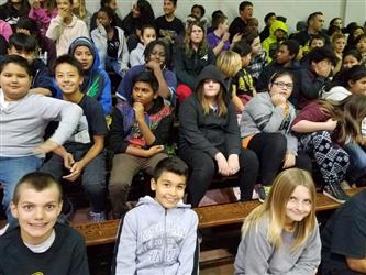 students seated in bleachers
