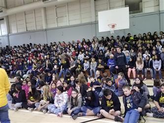 students seated in bleachers