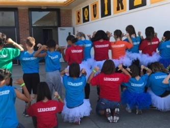 students wearing leadership shirts