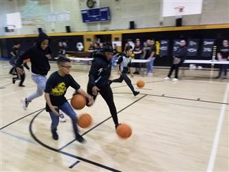 students playing basketball