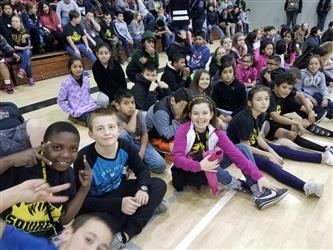 students seated on floor