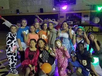 students posing for group photo