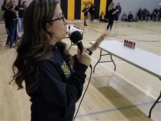 woman speaking into microphone